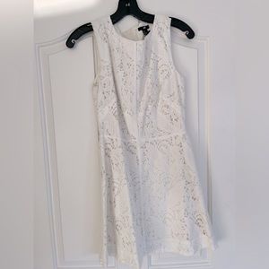 Sleeveless white lace dress